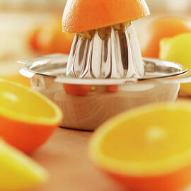 Oranges And Juicer by Adam Gault