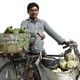 Portrait Of A Vegetable Vendor In by Paper Boat Creative