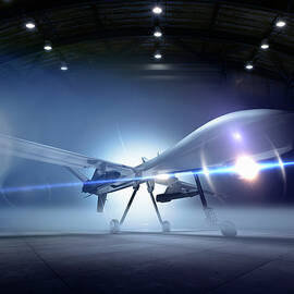Predator Drone At The Ready In A Hangar by Colin Anderson