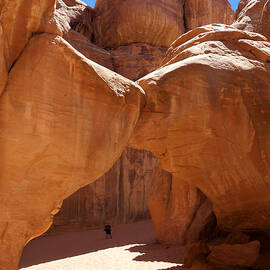 Sand Dune Arch with Gary by Mike McGlothlen