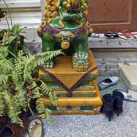 Shoes Outside the Temple by Sally Weigand
