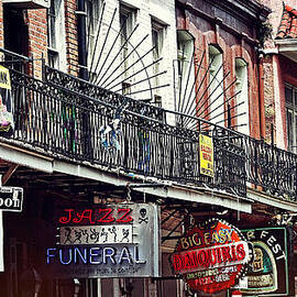 Signs on Rue Bourbon  by Bob Hislop
