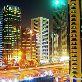 Skyscrapers On Sheikh Zayed Road, Night by Scott E Barbour