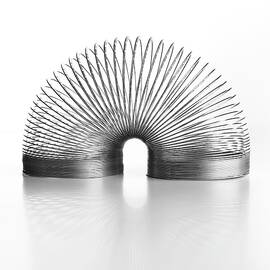 Slinky Spring by Science Photo Library