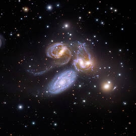 Stephan's Quintet by Science Photo Library