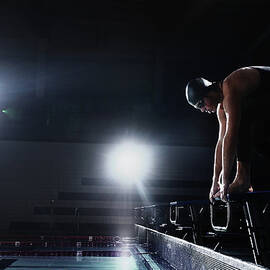 Swimmer Preparing On Starting Platform by Stanislaw Pytel