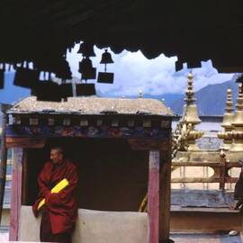 Tibetan Monk with Scroll on Jokhang Roof