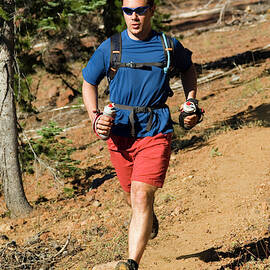 Trail Runner In Oregon by Lars Schneider
