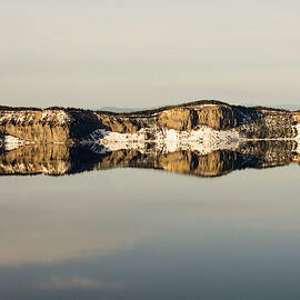 Trees And Rock Reflected In Crater by Corey Hendrickson