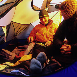 Two Climbers Are Tent-bound During An by Andrew Querner