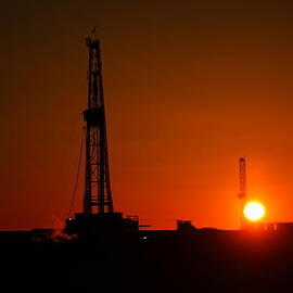 TWO OIL RIGS IN THE TWILIGHT by Jeff Swan