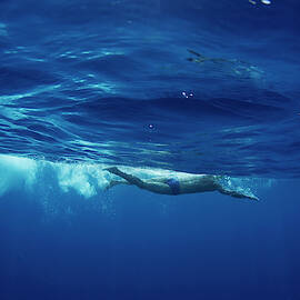 Underwater View Of A Swimmer Enjoying by Krystle Wright