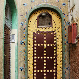 Uniquely Decorated Door With An Arch by Diane Levit / Design Pics