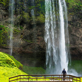 Waterfall with river and bridge Seljalandsfoss Iceland by Matthias Hauser