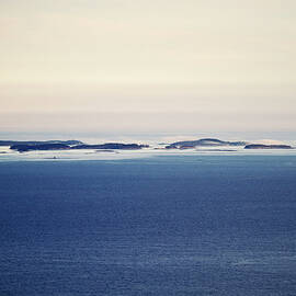 Whisps Of Fog Form Over The Outer by Chris Bennett