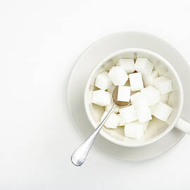 White Sugar Cubes by Science Photo Library