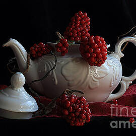 White teapot with red berries by Luv Photography