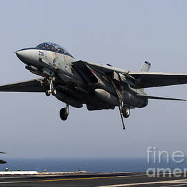 An F-14d Tomcat Comes In For An by Gert Kromhout