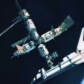 The Space Shuttle Docked With A Space Station by Stockbyte