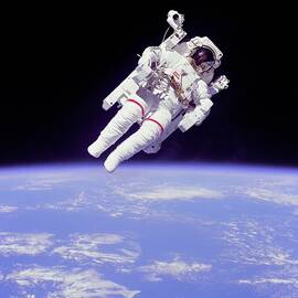 Astronaut Bruce Mccandless In Floating by Everett