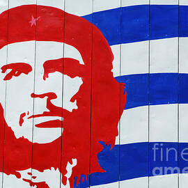 Billboard with the iconic Che Guevara portrait and national Cuba by Sami Sarkis Photography