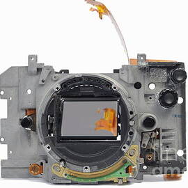 Body of broken 35mm film camera by Sami Sarkis Photography