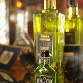 Bottles with Absinthe in Bar by Matthias Hauser