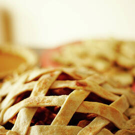 Close-up Of Fresh Pie With Lattice Pattern Crust by Jupiterimages
