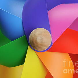 Colorful toy windmill by Sami Sarkis Photography