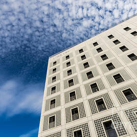 Modern architecture - library building and blue sky by Matthias Hauser