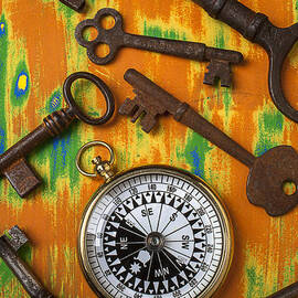 Old keys and compass by Garry Gay