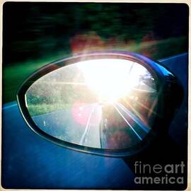 Sunlight in the rear mirror by Matthias Hauser
