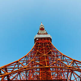 Tokyo tower faces blue sky