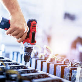 Assembling bitcoin mining machines. Cryptocurrency farm by Michal Bednarek