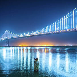 oakland bay bridge views near san francisco california in the ev by ALEX GRICHENKO