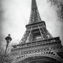 Eiffel Tower and Lamp Post BW by Joan Carroll