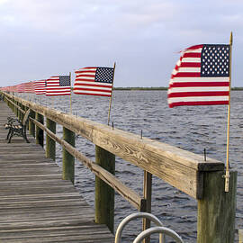 Flags on the Pier by Sally Weigand