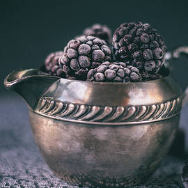 Frozen Black Berries  by Irena Kazatsker