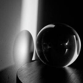 Glass Sphere in Light and Shadow