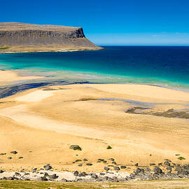 Golden sand beach in Iceland Westfjords by Matthias Hauser