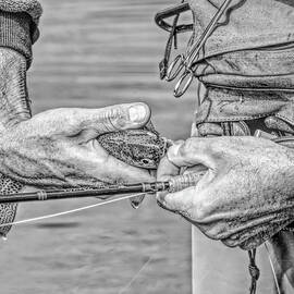 Hands of a Fly Fisherman Monochrome by Jennie Marie Schell