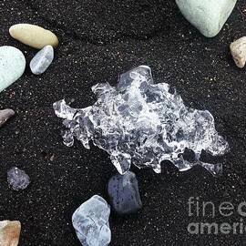 Ice On A Black Sand Beach In Iceland by Courtney Dagan For Poet's Eye