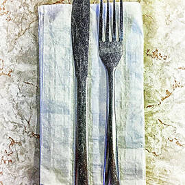 Knife Fork Napkin on Linoleum Table by Andrew Wohl