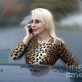 Blonde Woman On A Cell Phone by Yuri Lev