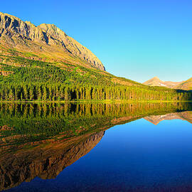 Morning Reflections at Fishercap Lake by Greg Norrell