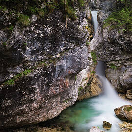 Nemclja waterfall below a natural bridge horizontal by Blaz Gvajc