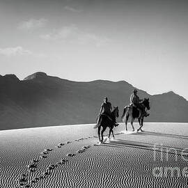 On Horseback at White Sands by Susan Warren