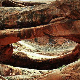 Pothole Arch in Arches National Park by Nadalyn Larsen