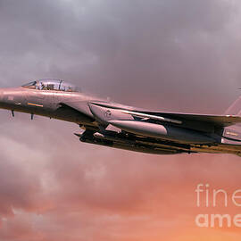 RAF Lakenheath F-15 Eagle in flight with orange sun light by Simon Bratt