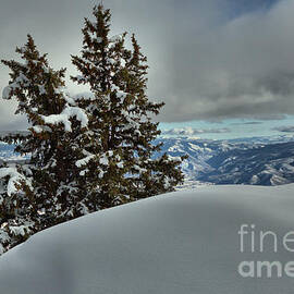 Snow Drifts And Mountains by Adam Jewell